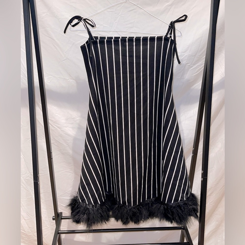 Stripped dress with fur at bottom
